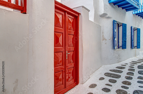 red and blue doord and windows in Mykonos, Greece photo