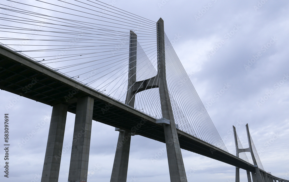Fototapeta premium The Vasco Da Gama bridge on a cloudy day