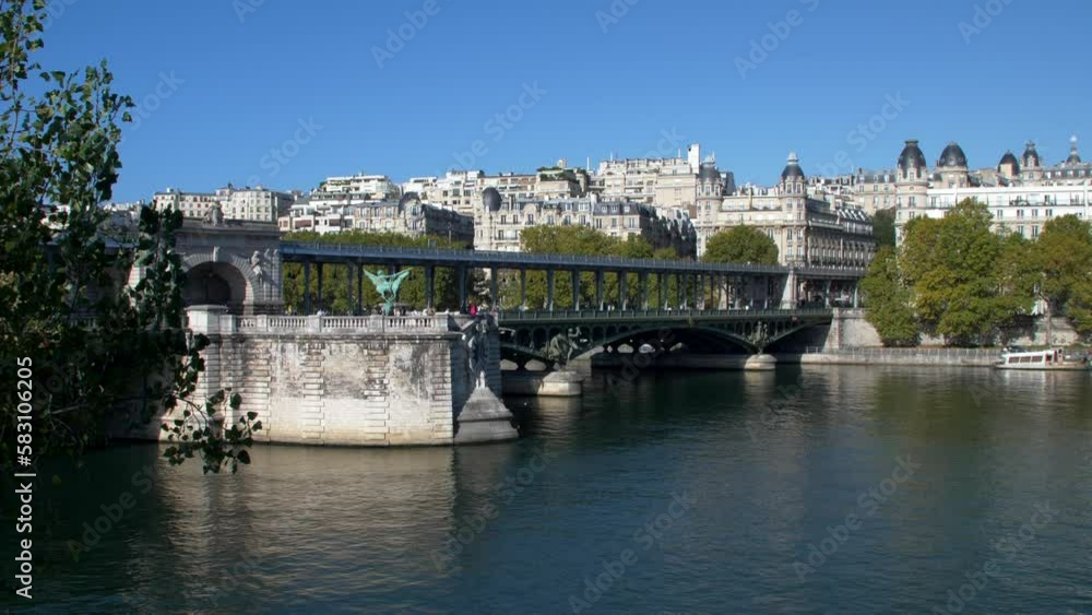 Paris, France - October 2022. The Bir Hakeim bridge in Paris on autumn day in Paris. France. Panning 4K
