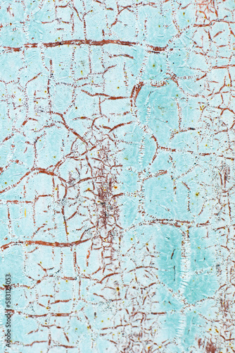 Rusty metal abstract background. Texture of an old blue grunge metal plate with cracked paint.