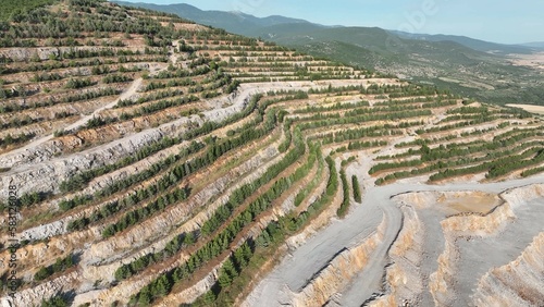 Work at a huge limestone quarry, production of aggregates., heavy machines in action, transferring the material, crusher complex, travel with ships