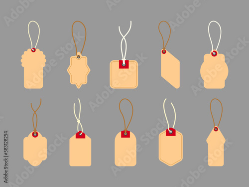 Realistic carton brown paper price tags, different shapes isolated on grey background. Blank cardboard shopping labels with strings, vector illustration.
