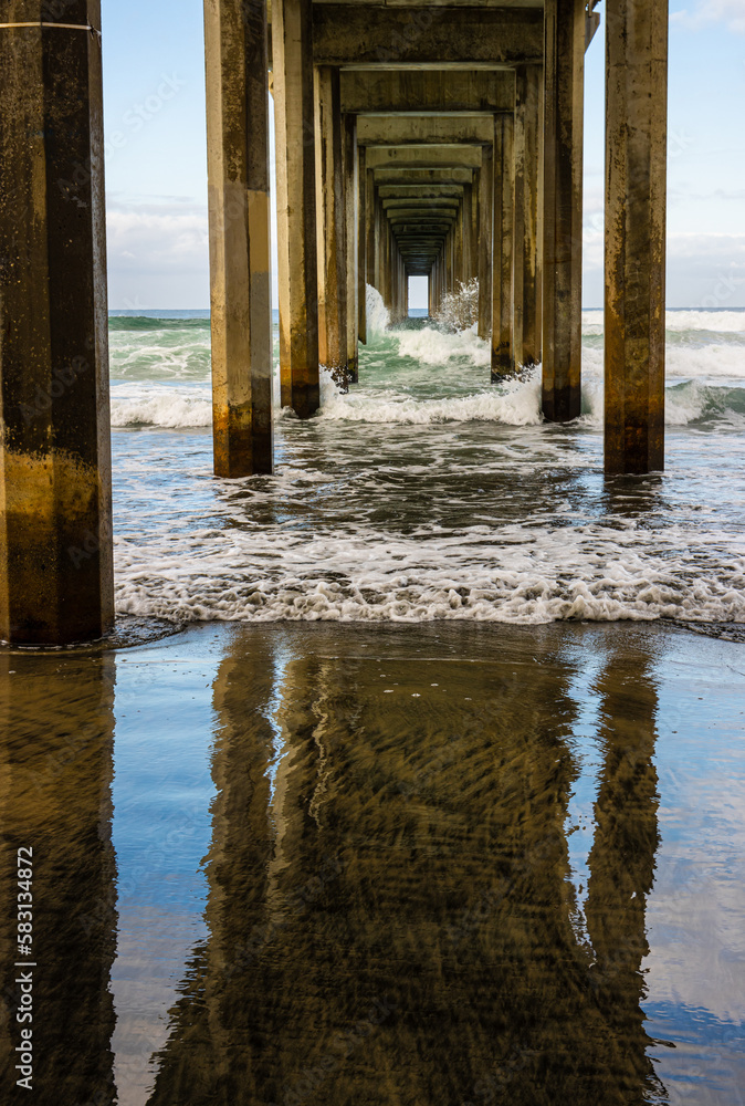 Reflections Under Scripps Memorial Pier on La Jolla Shores Beach, La Jolla, California, USA