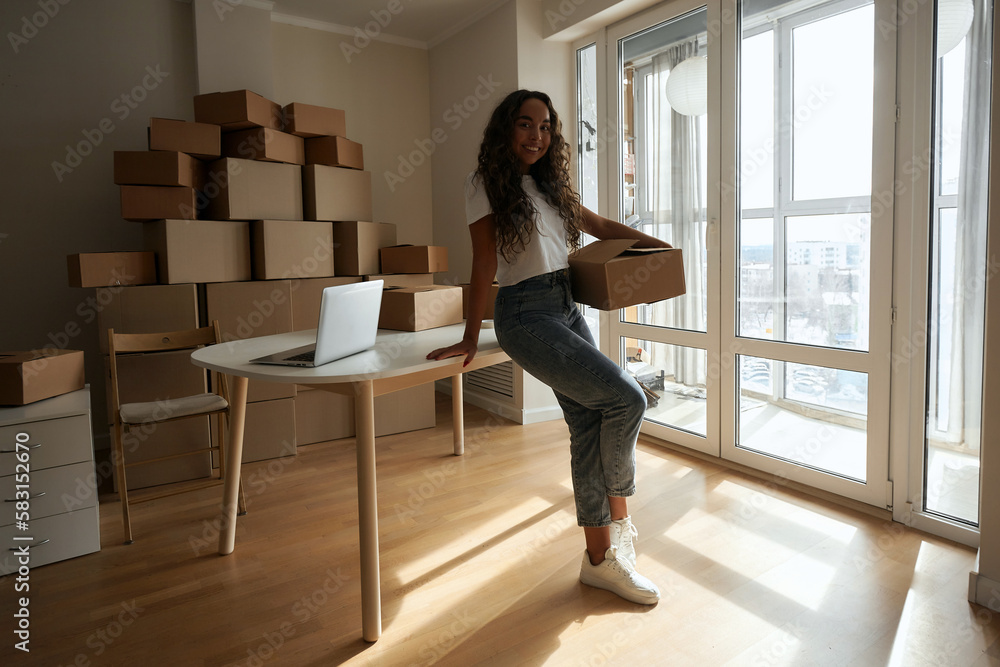 Young Asian female business owner online prepare parcel boxes for customers to call and talk to customers to confirm receipt of goods. Check balance and delivery address and phone number Young Asian female business owner online prepare parcel boxes for customers to call and talk to customers to confirm receipt of goods. Check balance and delivery address and phone number