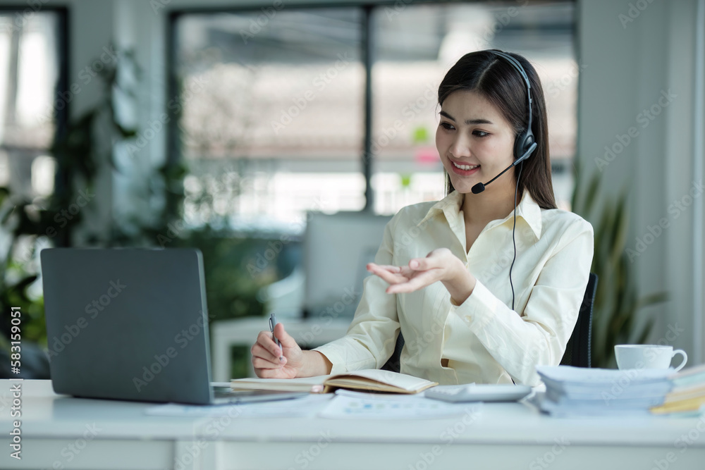 close up call center operator in wireless headset talking with customer, woman in headphones with microphone consulting client on phone in customer support service, looking at computer screen. close up call center operator in wireless headset talking with customer, woman in headphones with microphone consulting client on phone in customer support service, looking at computer screen.