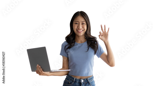 Asian woman in casual clothes holding working laptop in freelance work concept with single laptop can earn money, Invitation to apply or register to receive special privileges and prizes. © Puwasit Inyavileart