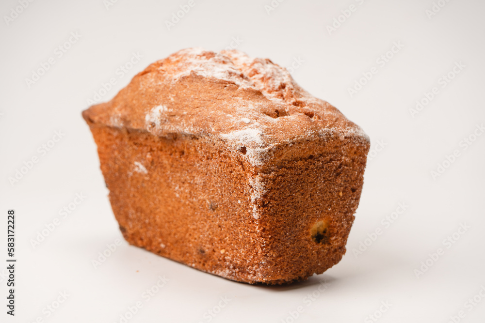 A cupcake with raisins isoalted on a white background. A cupcake with raisins isoalted on a white background.