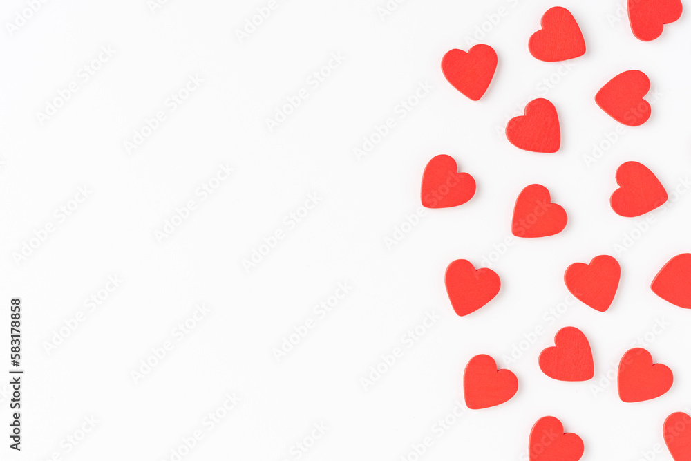 Overhead shot of cute red hearts on white background with copyspace. Flat lay