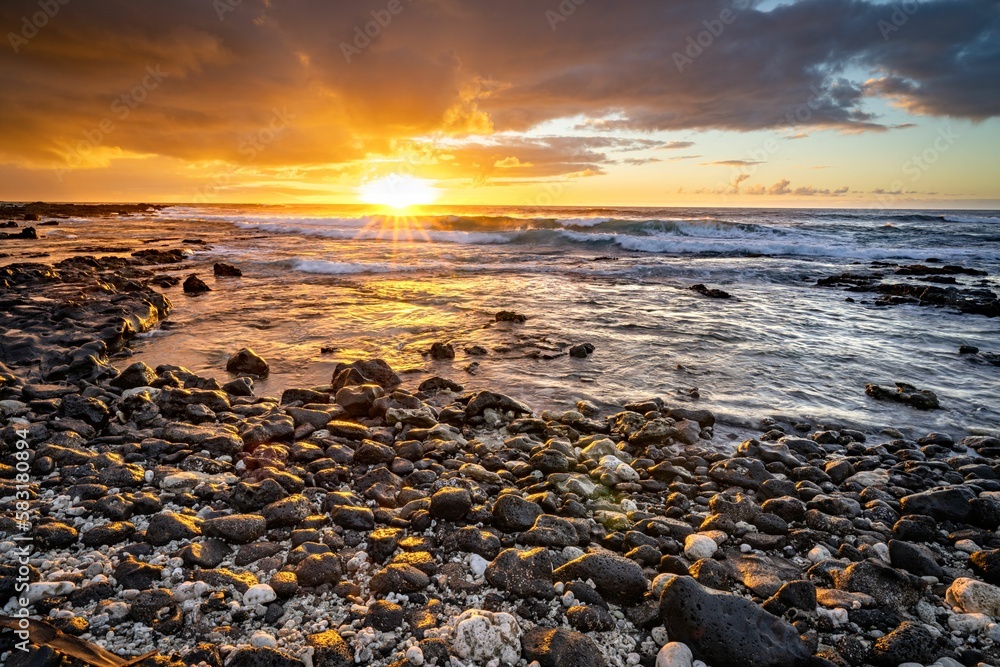 Sunrise over the rocky beach in Oahu, Hawaii. Sunrise over the rocky beach in Oahu, Hawaii.