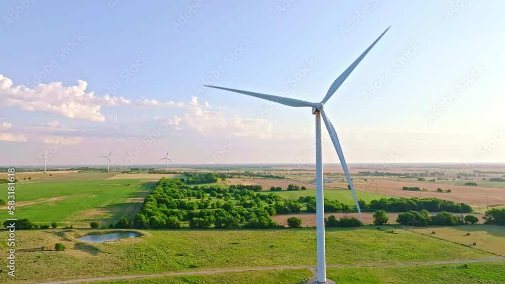 Wind turbine on the wide farm field Wind turbine on the wide farm field
