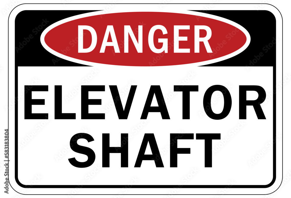 Elevator warning sign and labels elevator shaft