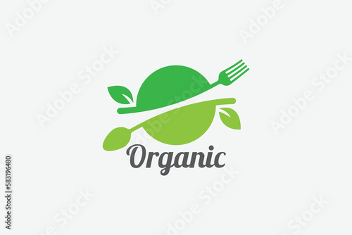 organic food logo with a combination of a fork, spoon, and leaves.