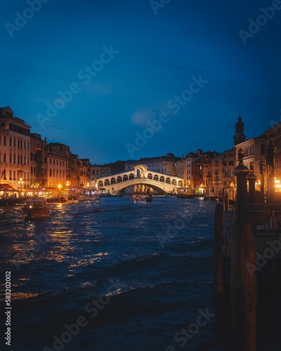 Vertical shot of the Rialto bridge in the evening, Venice, Italy