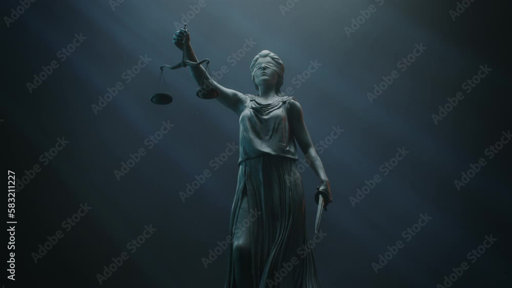 Cinematic and Atmospheric Shot of Lady Justice Sculpture. The Statue is