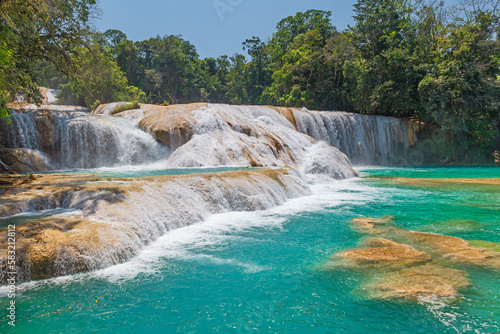 Agua Azul turquoise waterfall and cascade with tropical rainforest, Palenque, Chiapas, Mexico.