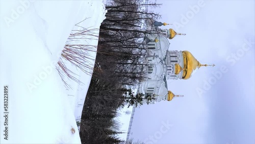 Belogorsky St. Nicholas Orthodox Missionary Monastery. Russia, Perm Krai, Belaya Gora. The temple on the hill in winter. Monastery on the background of snow. 4K photo