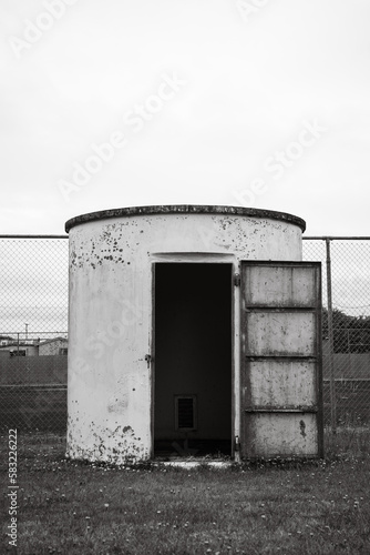 Old unused round shed in Mangakino New Zealand at local school photo