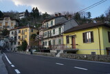 street in town with colorful building by lake Maggiore, Ticino