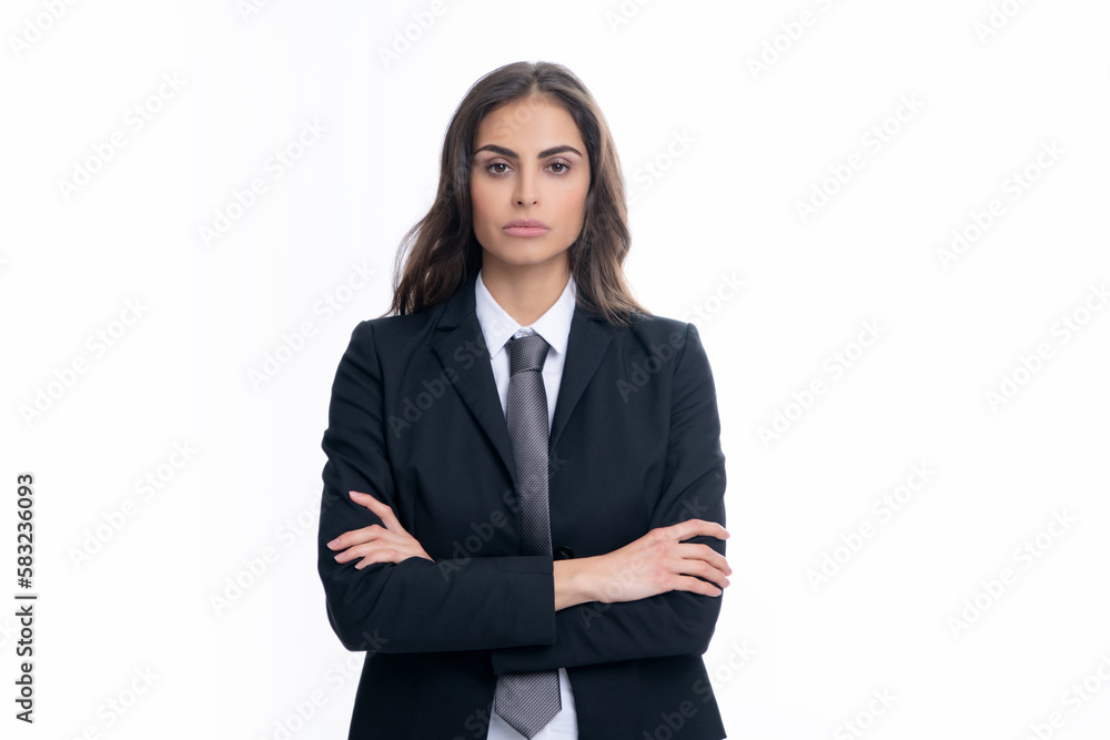 Female student, young teacher. Portrait of business woman in suit crossed arms. Confidence businesswoman against grey background with copy space. Female student, young teacher. Portrait of business woman in suit crossed arms. Confidence businesswoman against grey background with copy space.