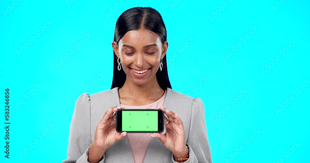 Chroma key, green screen and woman with phone for product placement, branding and mobile app advertising. Smile, happy and portrait of professional female isolated in a studio blue background Chroma key, green screen and woman with phone for product placement, branding and mobile app advertising. Smile, happy and portrait of professional female isolated in a studio blue background