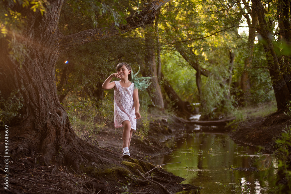 Teenage girl fooling around near small river, stream. Diversity child generation Z with green hair Teenage girl fooling around near small river, stream. Diversity child generation Z with green hair