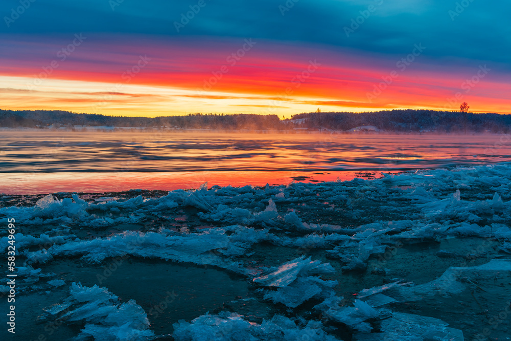 Colorful sunrise at icy river Colorful sunrise at icy river