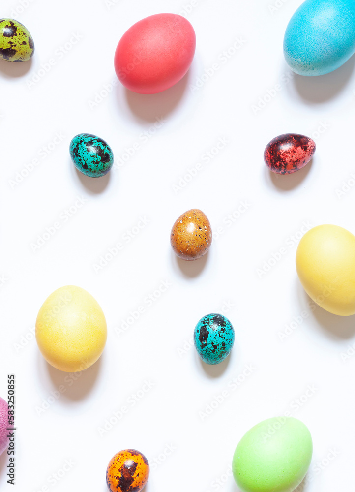 Colorful painted Easter eggs on the white background. Top view. Colorful painted Easter eggs on the white background. Top view.