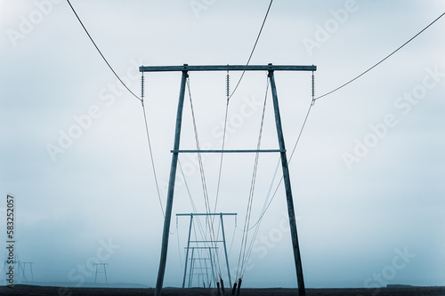 High voltage electric poles located in countryside