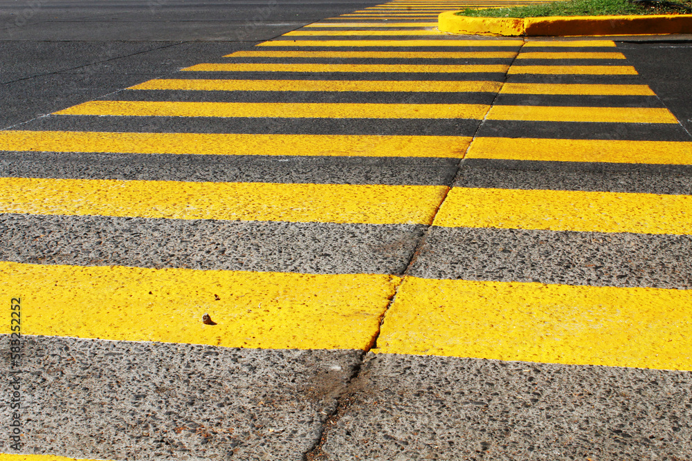 street paved with paint to mark the pedestrian crossing