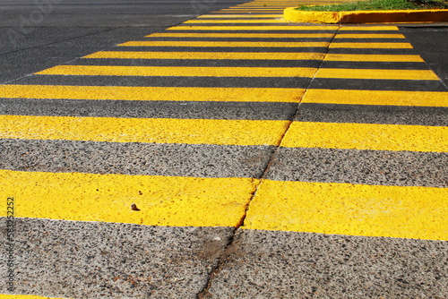 Obraz na płótnie street paved with paint to mark the pedestrian crossing w salonie