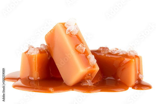 Delicious candies with caramel sauce and sea salt isolated on a white background