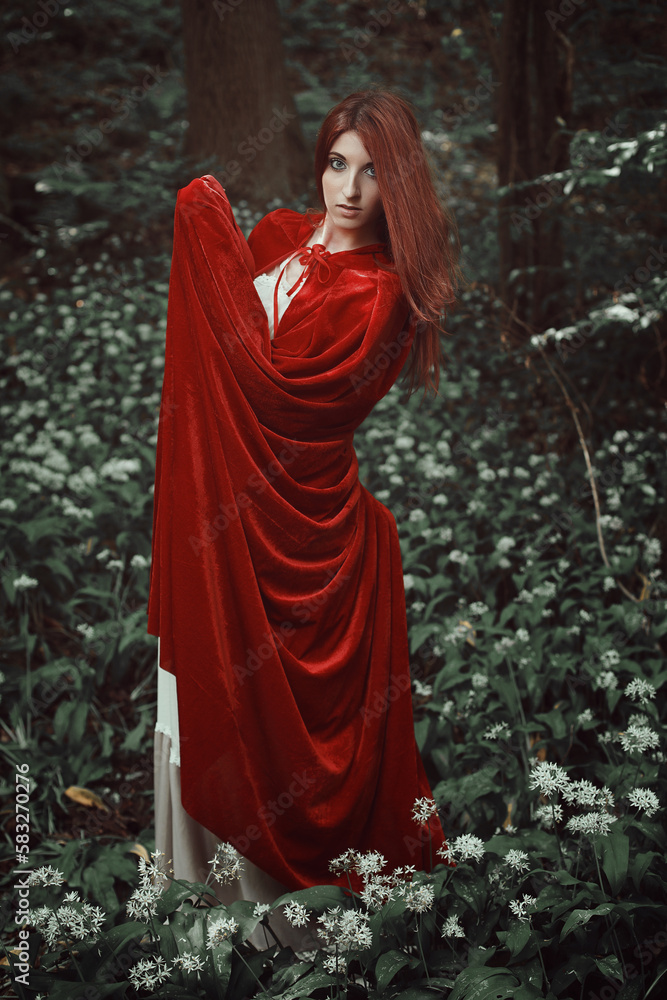 Beautiful fantasy woman with red cloak Beautiful fantasy woman with red cloak