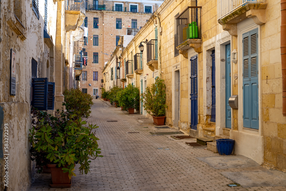 Typical, pedestrian street in Valetta, Malta Typical, pedestrian street in Valetta, Malta