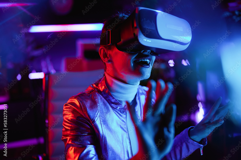 smiling trendy woman testing out metaverse in modern office smiling trendy woman testing out metaverse in modern office