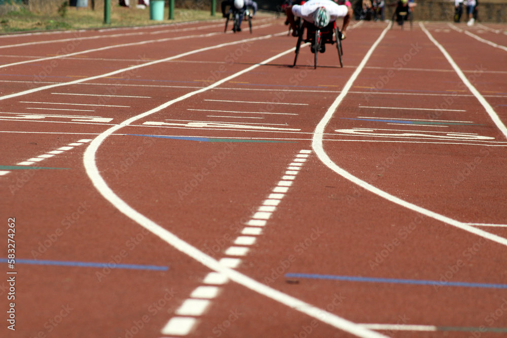 wheelchair paralympic athletes training in morning session on running track