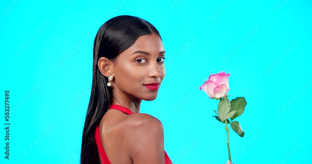 Studio face, beauty woman and flower for Valentines day, sustainable agriculture portrait and natural organic product. Eco friendly makeup, floral plant or skincare person isolated on blue background Studio face, beauty woman and flower for Valentines day, sustainable agriculture portrait and natural organic product. Eco friendly makeup, floral plant or skincare person isolated on blue background