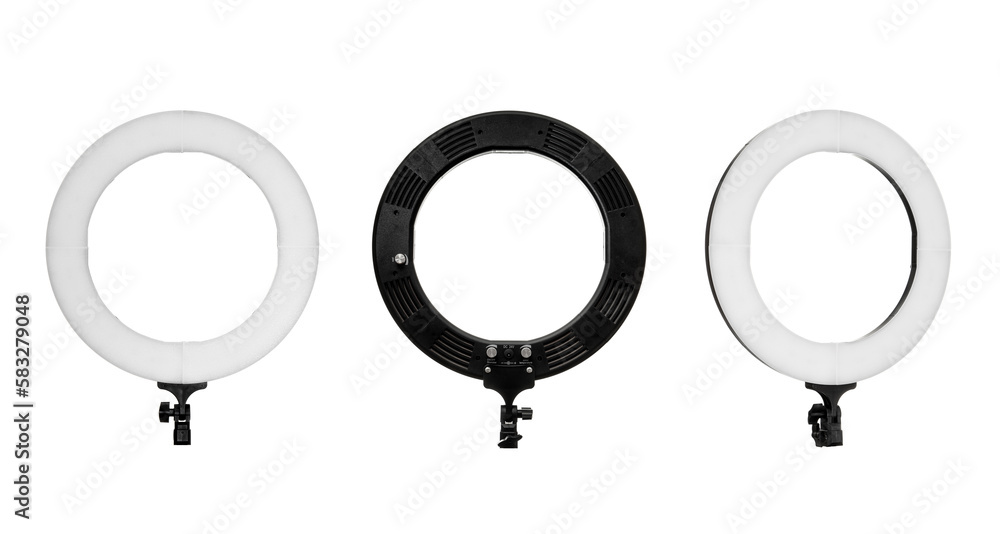 Closeup of circular neon LED lamp. Popular modern light for make-up and beauty portraits. Isolate on a white back. Closeup of circular neon LED lamp. Popular modern light for make-up and beauty portraits. Isolate on a white back.