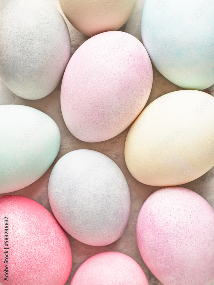 Easter background. Colorful dyed Easter eggs close up. Pastel pale colors. Abstract, top view. Easter background. Colorful dyed Easter eggs close up. Pastel pale colors. Abstract, top view.