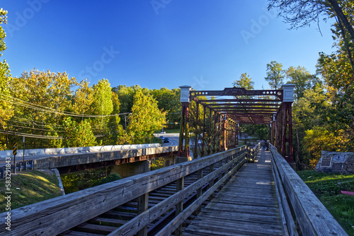 Traditional steel and wooden bridge over the river, Laurel, MD, USA photo