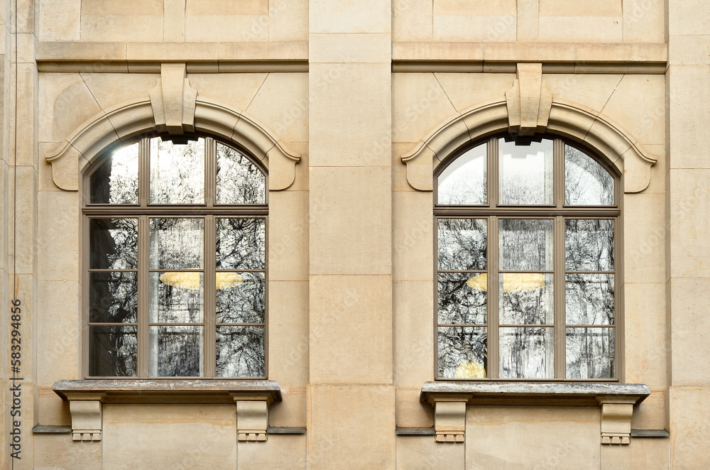 Obraz premium View of beautiful building with wooden windows