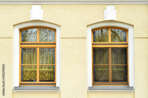 View of beautiful building with wooden windows