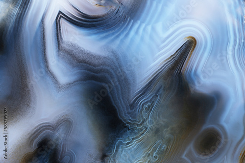 Fullscreen detailed view of white blue black agate with a smooth pattern