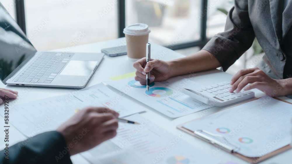 Auditor and the company's bookkeeper jointly review the balance sheet and assets, liabilities and equity information in the quarterly report, bookkeeping concept. Auditor and the company's bookkeeper jointly review the balance sheet and assets, liabilities and equity information in the quarterly report, bookkeeping concept.