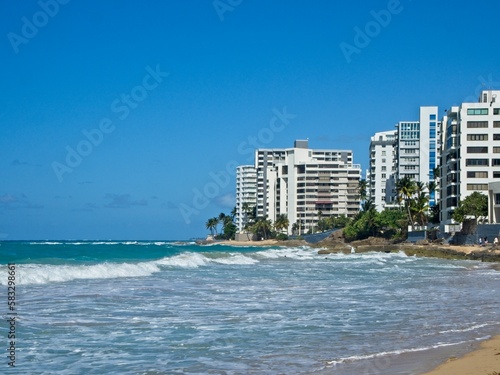 Beautiful (and strong) turquoise waves crash on the shores of Playa Condado (Condado Beach).  These waves were so strong I got knocked down several times and lost two pairs of sunglasses © Andrew