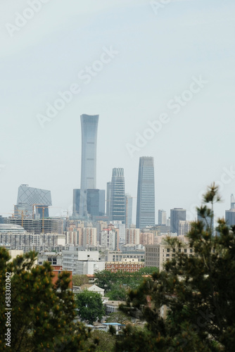 Beijing, China - 04 20 2019: The view from the forest over downtown Beijing