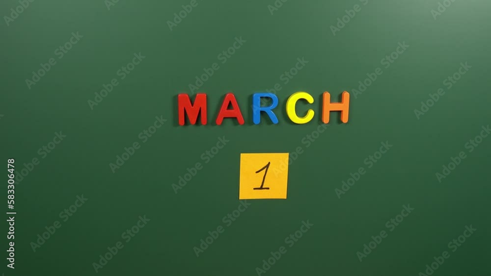 Hand sticking a sticker 1 March calendar day on school board. 1 date of March. First day of March. 1st date number. 1 day calendar. One date. Martisor, Zero tolerance Hand sticking a sticker 1 March calendar day on school board. 1 date of March. First day of March. 1st date number. 1 day calendar. One date. Martisor, Zero tolerance