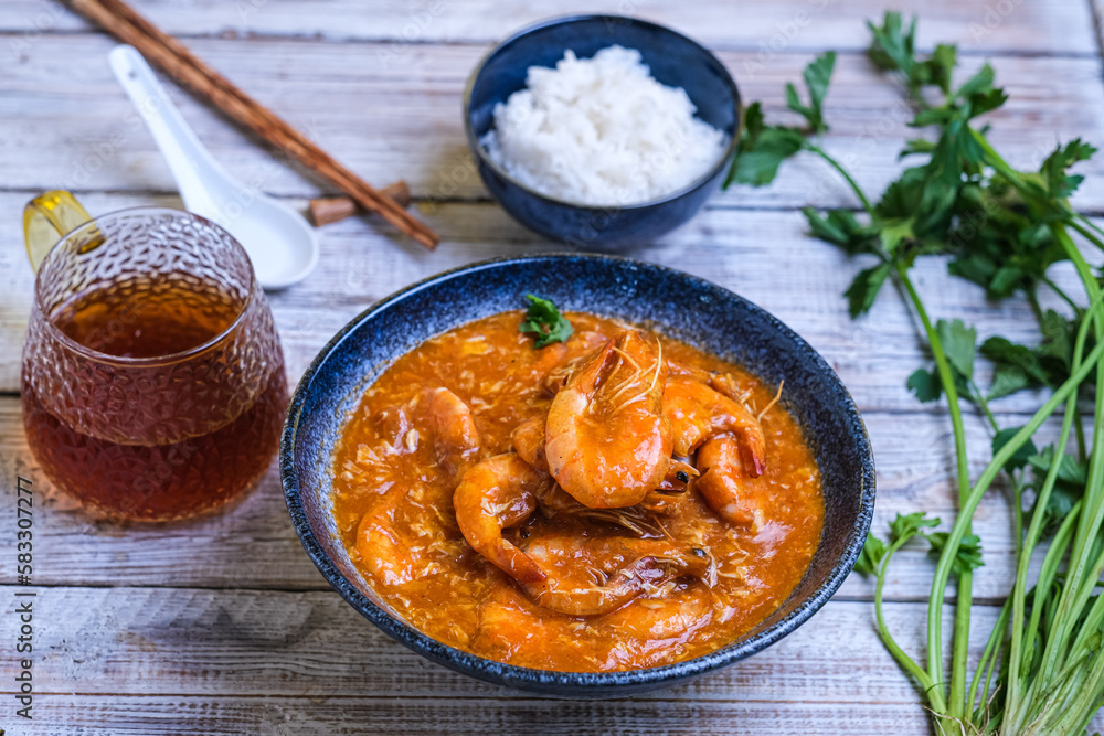 udang saus padang or prawn in padang sauce. Padang is the name city in sumatera barat, Indonesia udang saus padang or prawn in padang sauce. Padang is the name city in sumatera barat, Indonesia