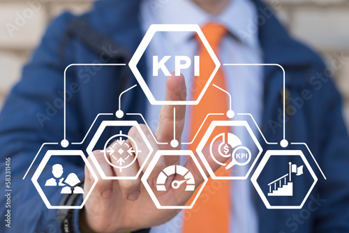 Man using virtual touchscreen presses acronym: KPI. KPI Key Performance Indicator Concept. Business goals, performance results and indicators. Business planning and measure success, target achievement