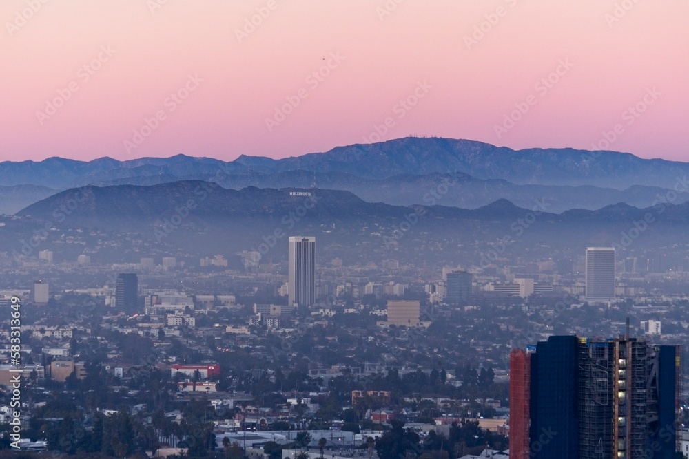 Mist rolls in from the Pacific Ocean into the Los Angeles Basin as evening falls
