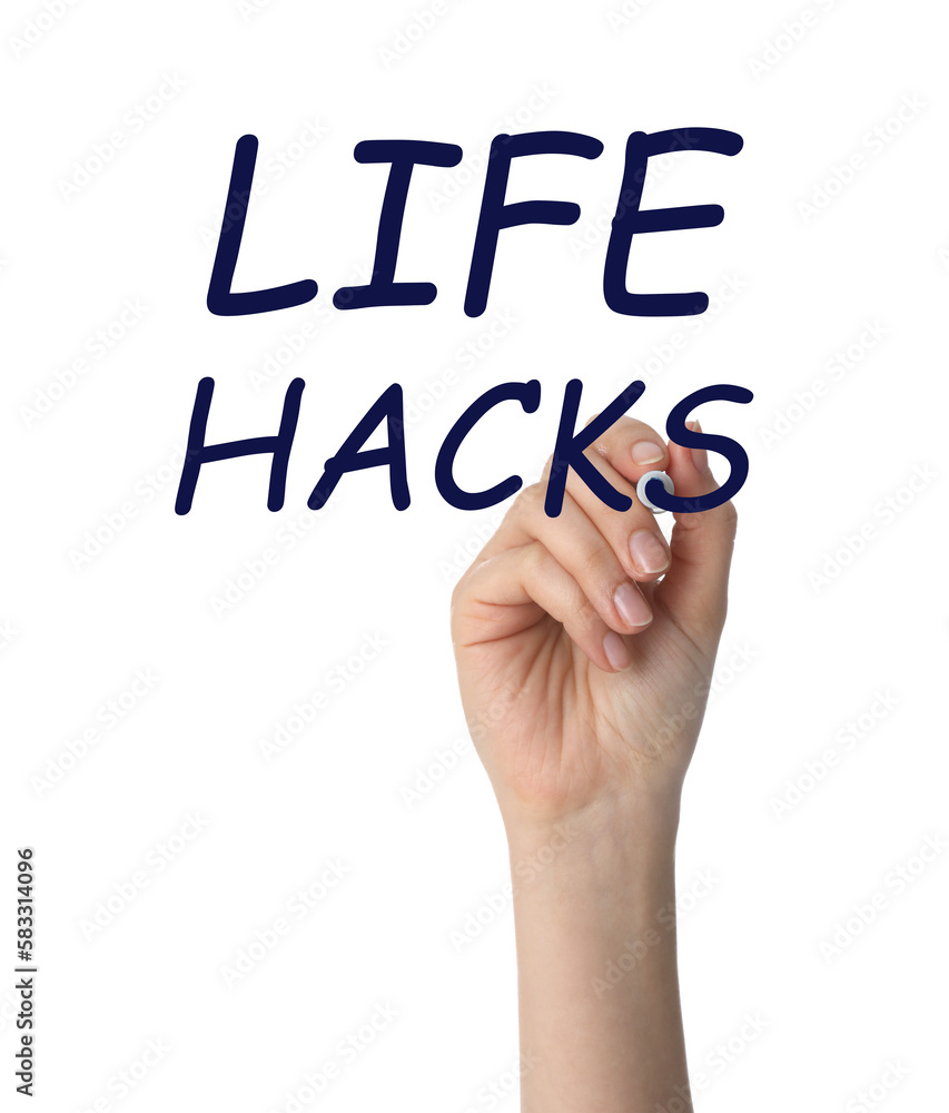 Woman writing words Life Hacks with marker on glass board against white background, closeup Woman writing words Life Hacks with marker on glass board against white background, closeup